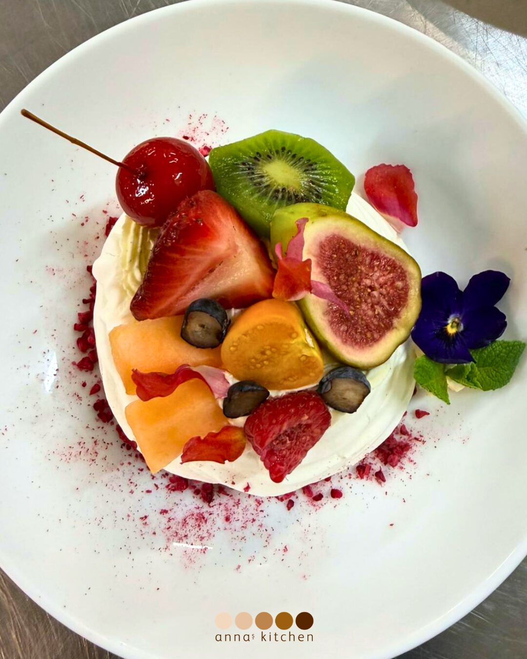 Anna's Kitchen Catering - Desserts - Fresh Fruit pavlova, sweet cream and passion fruit sauce